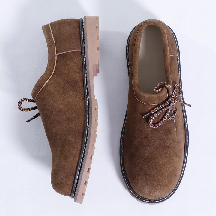 Trendige dunkelbraune Lederhosen-Herrenschuhe